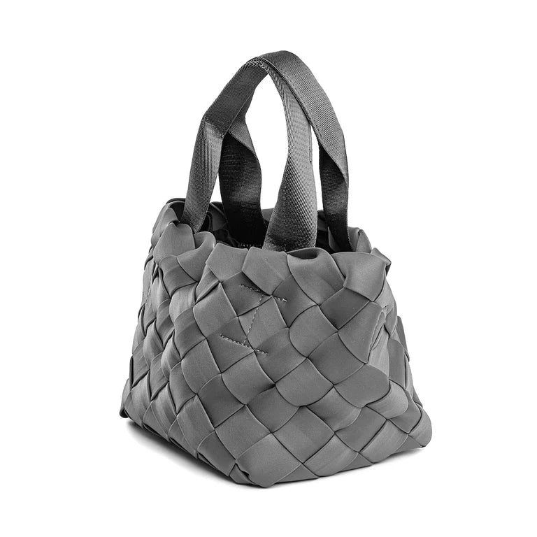 JACKIE. BOLSO DE NEOPRENO TRENZADO GRIS