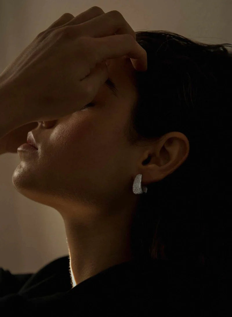 Thick design hoop earrings with full zirconia setting