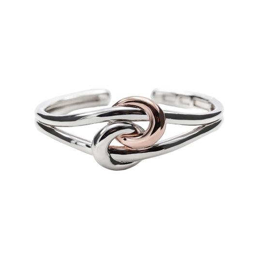 Esclava de plata bicolor con diseño de nudo entrelazado
