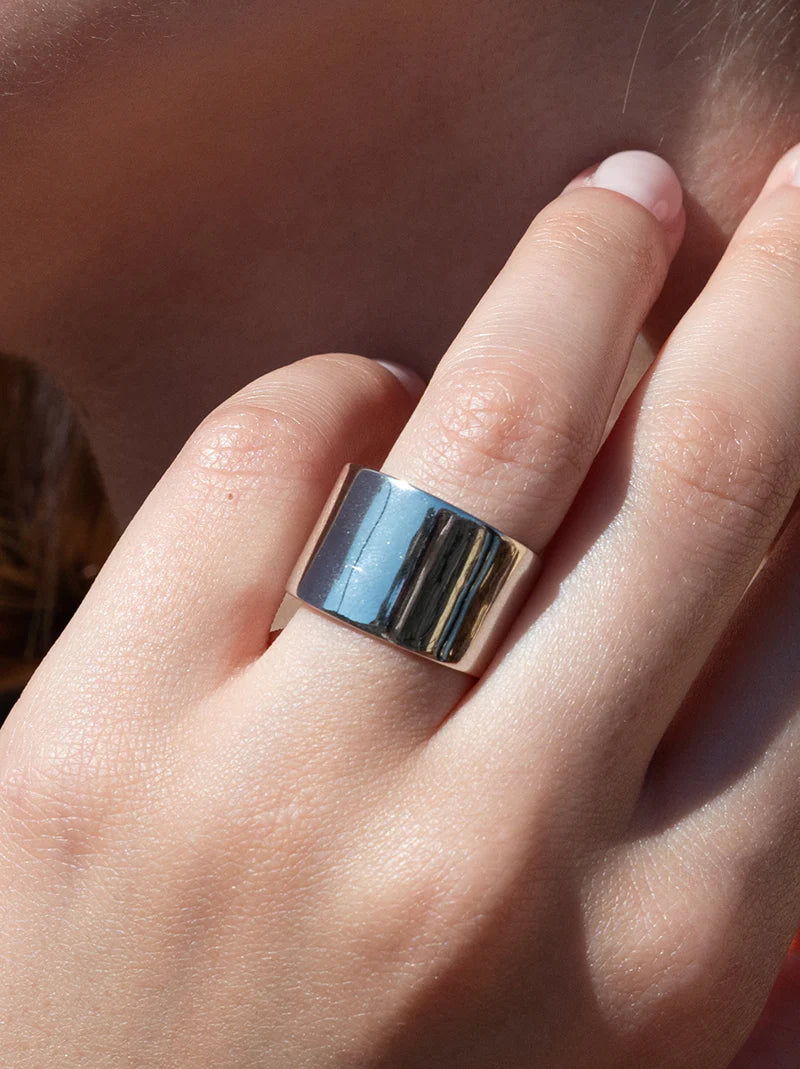 Wide plain silver rings, regular and smooth design