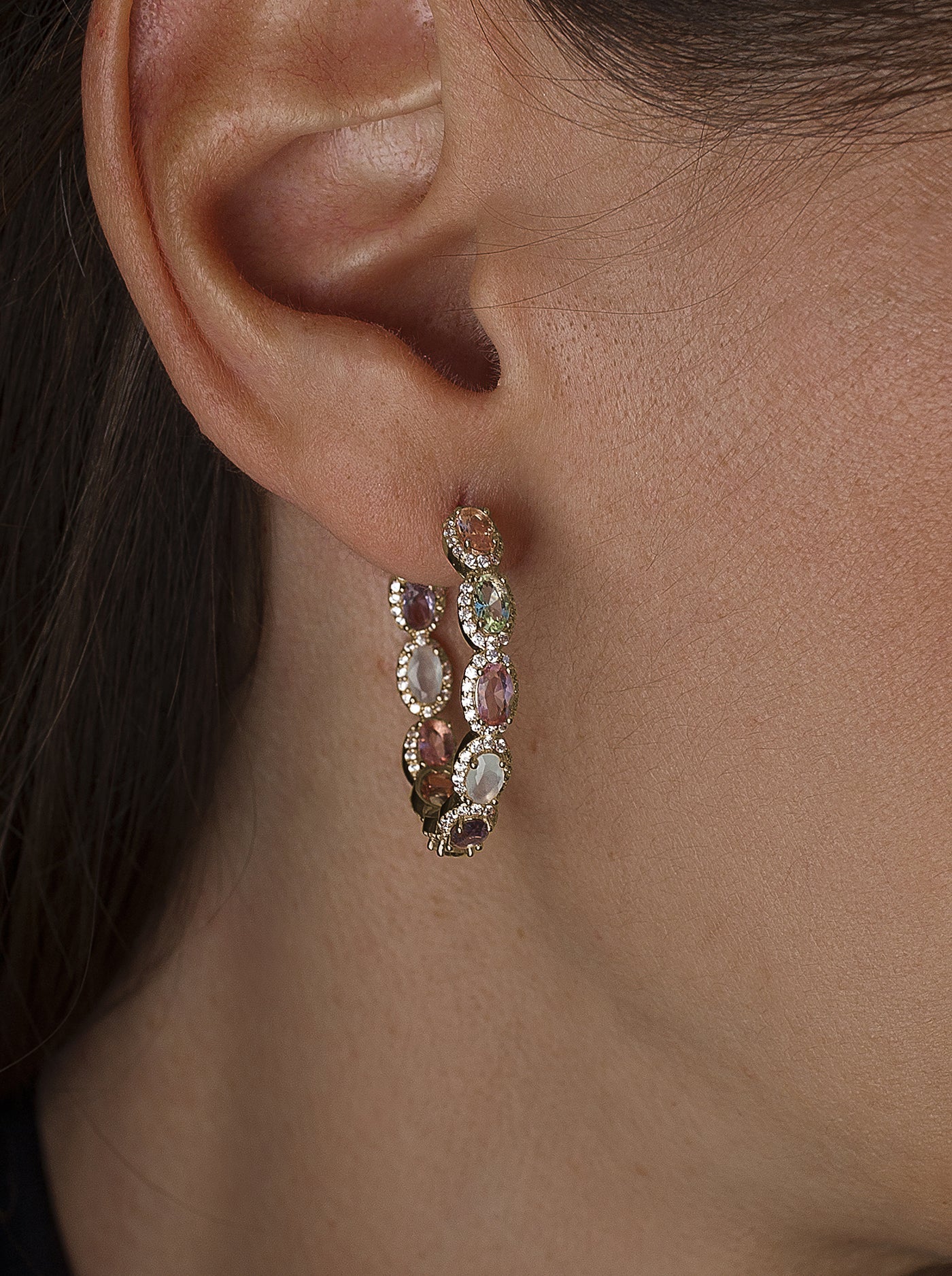 Hoop earrings with pink stones and zircons