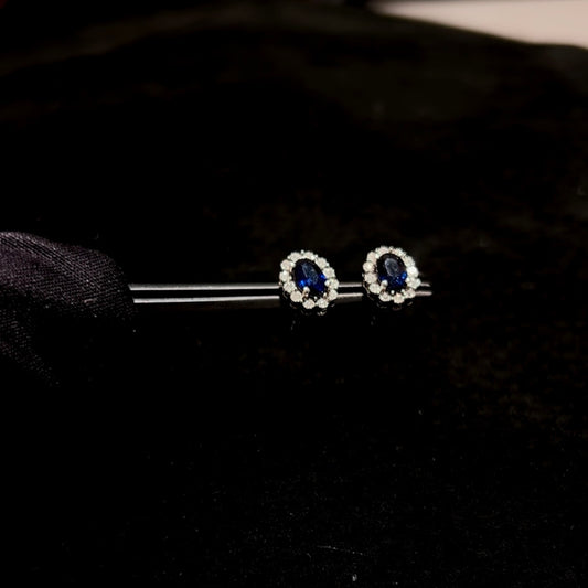 Pendientes oro Blanco 18 ktes Diamantes y zafiro azul