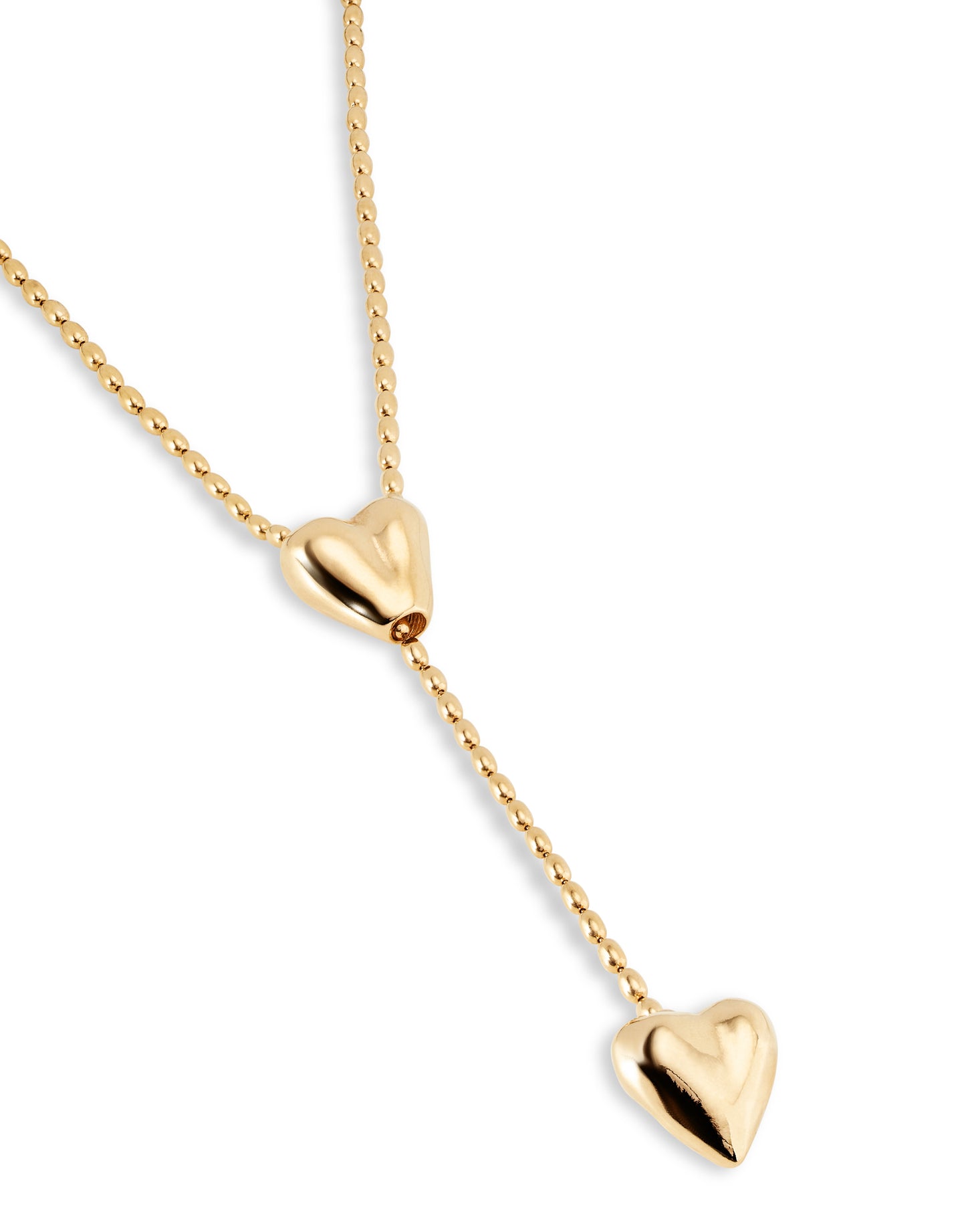 Cadena bañada en oro 18k con dos corazones, uno ajustable en el centro.