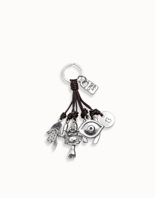 Clauer de cuir i amulets banyat en plata de llei