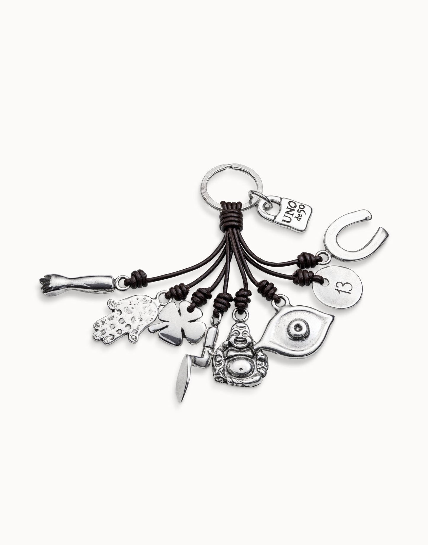 Clauer de cuir i amulets banyat en plata de llei