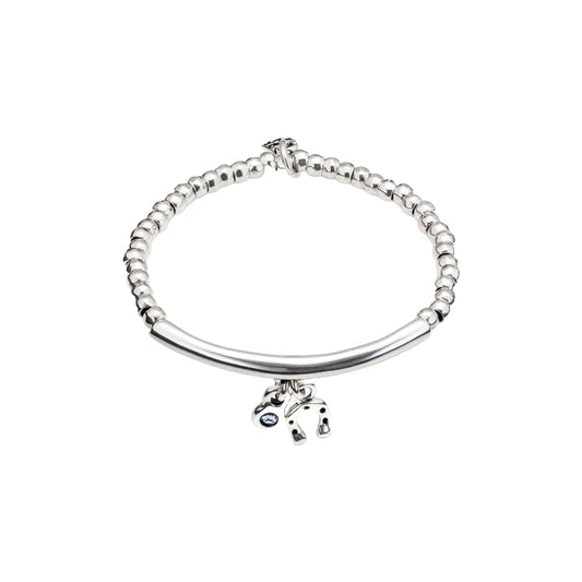 Sterling silver plated elastic bracelet with tubule and charms