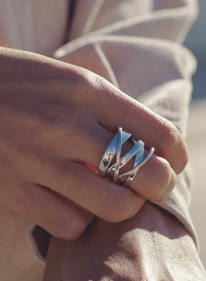 Large irregular interlaced silver rings
