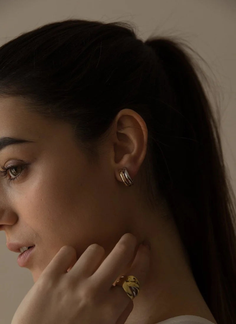Two-tone earrings with thick double band design