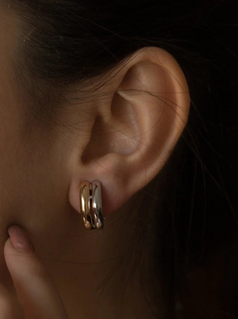 Two-tone earrings with thick double band design